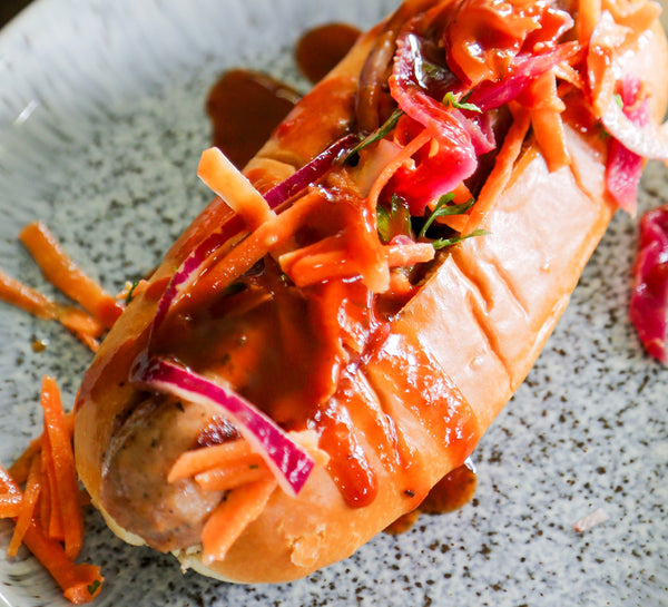 Sriracha Hot Dogs with Asian Slaw